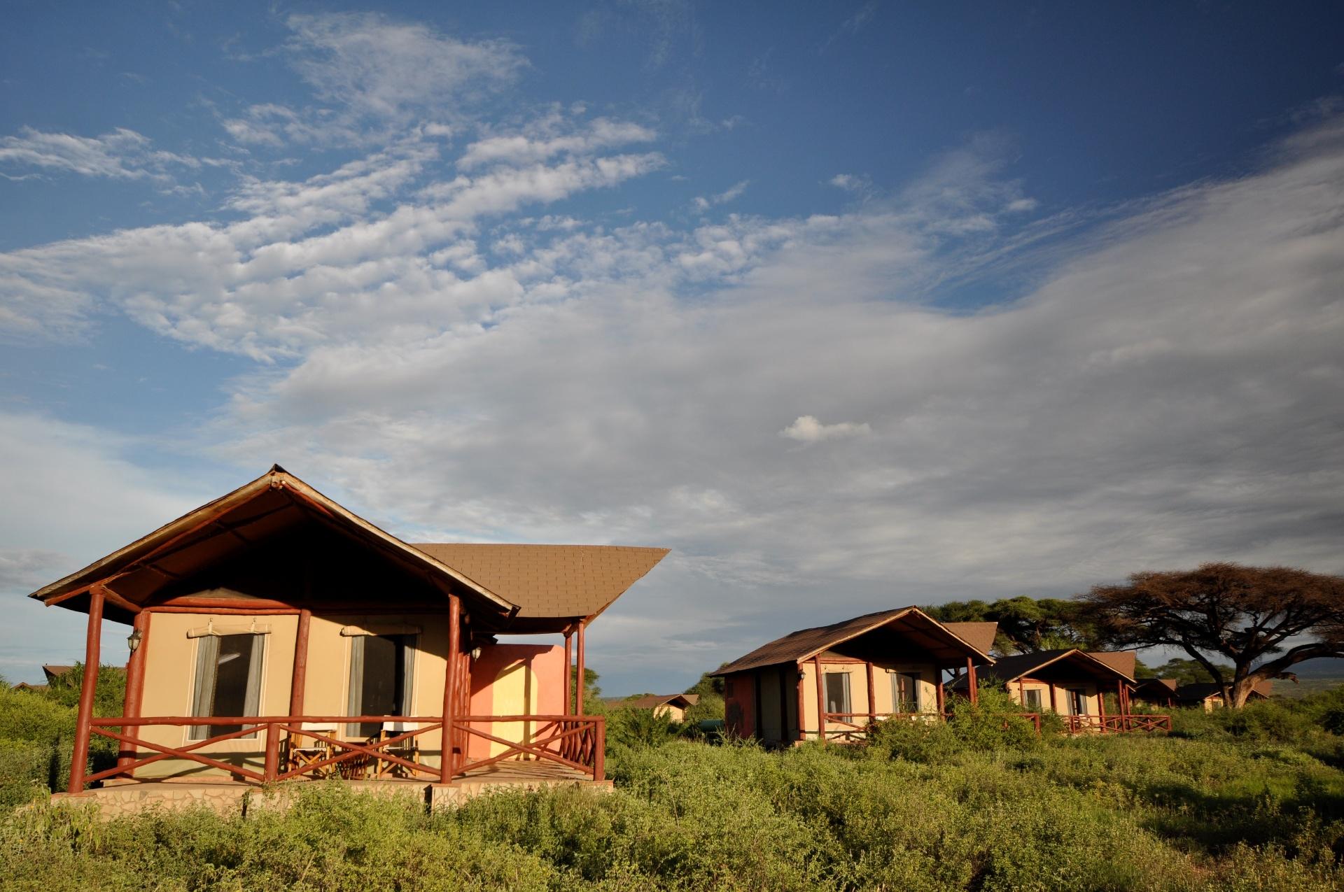 Luxury safari tents set against the Amboseli landscape