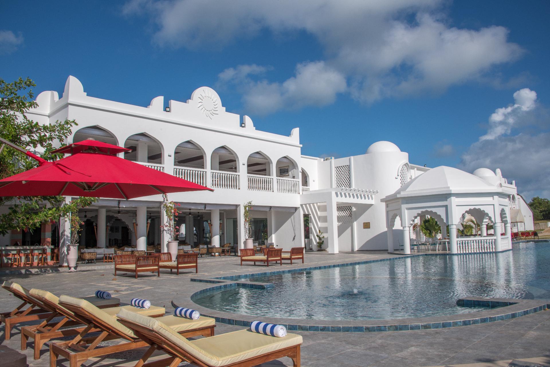 Stunning white architecture luxury resort with large swimming pool